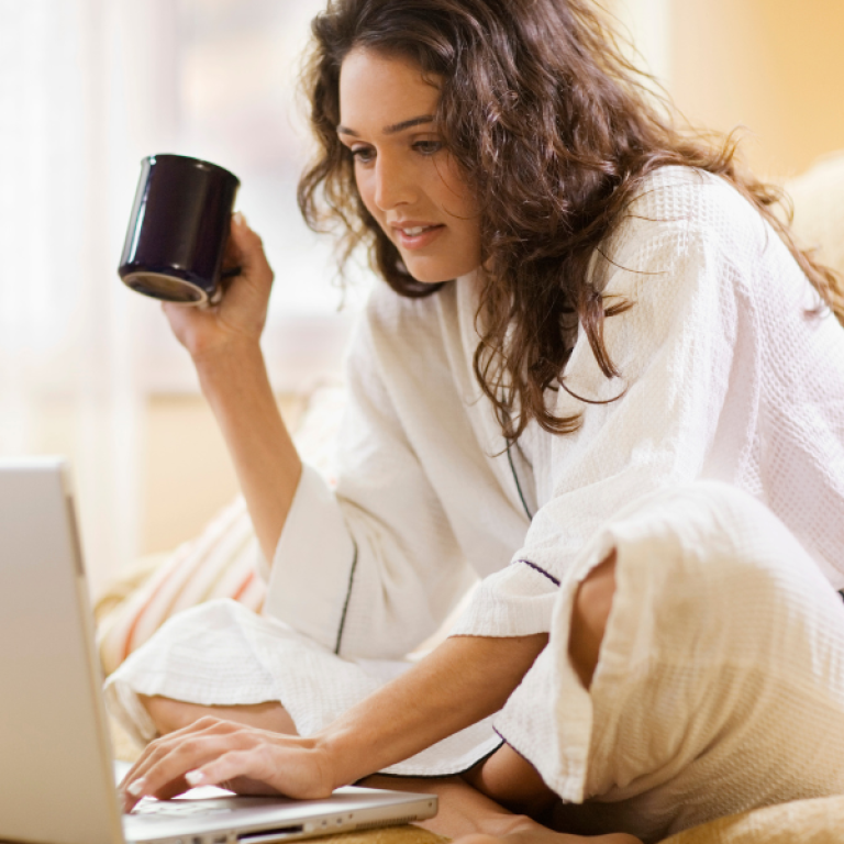 woman researching non-surgical BBL cost in Fairfax