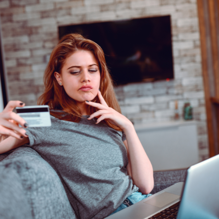 woman researching emsculpt price in Merrifield VA