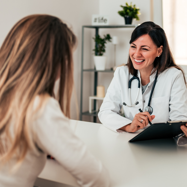 woman attending first CoolSculpting session in Alexandria