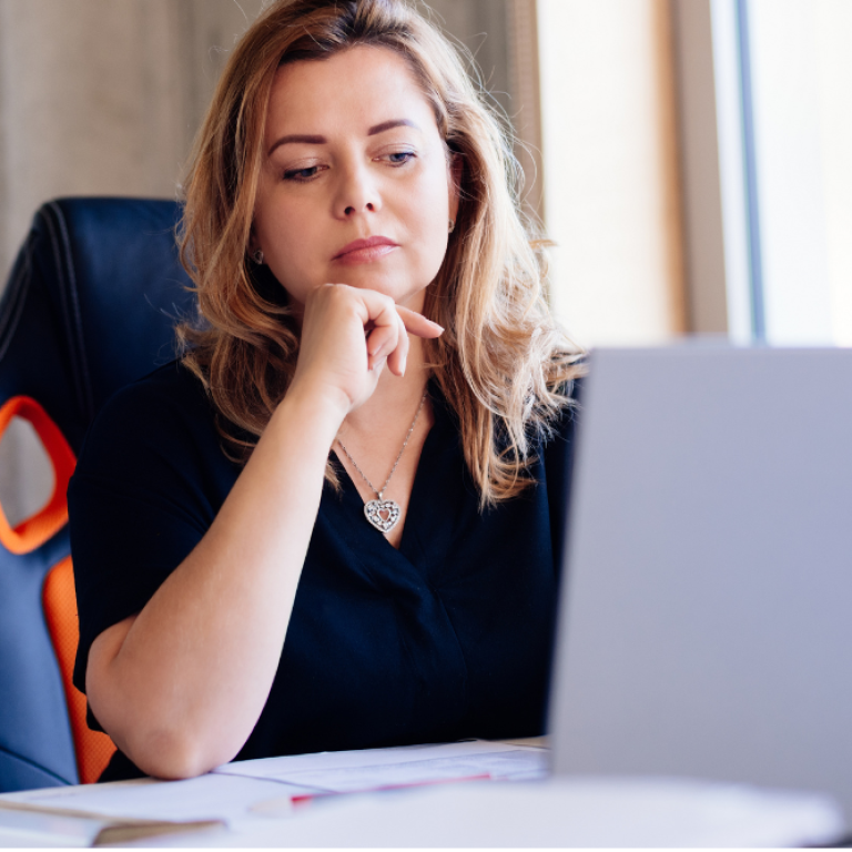 woman researching liposuction prices near Falls Church