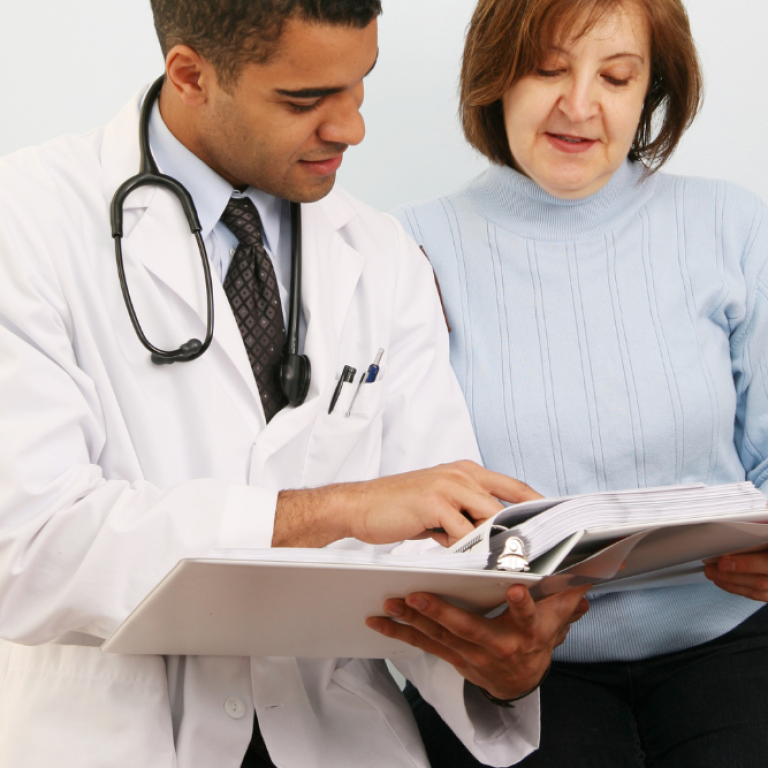 doctor and patient discussing non-surgical facelift options near Tysons Corner