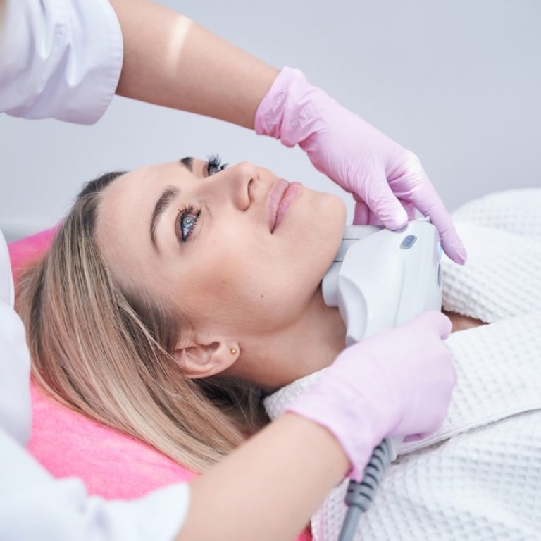 woman trying non-surgical skin tightening near Arlington