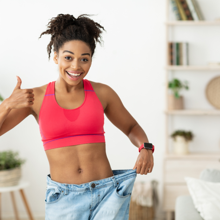 woman showing off waist after taking semaglutide in Alexandria