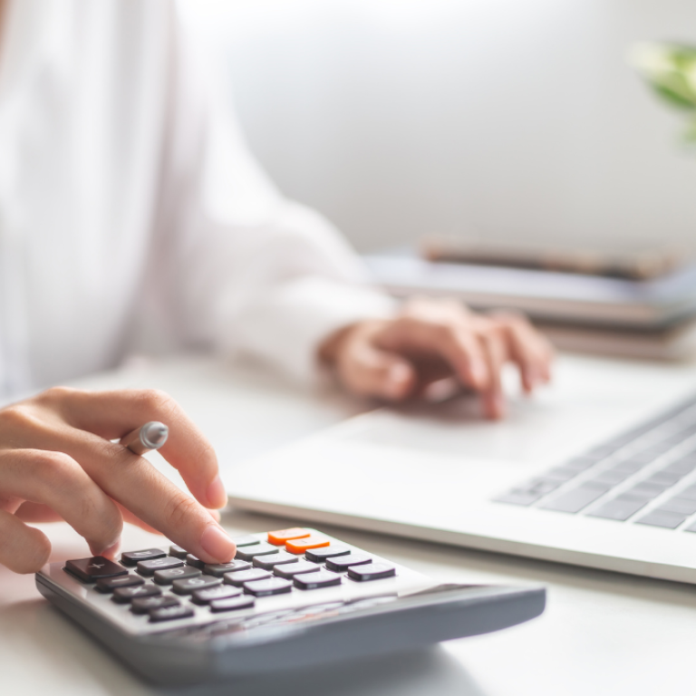 woman calculating skin tightening cost in Arlington
