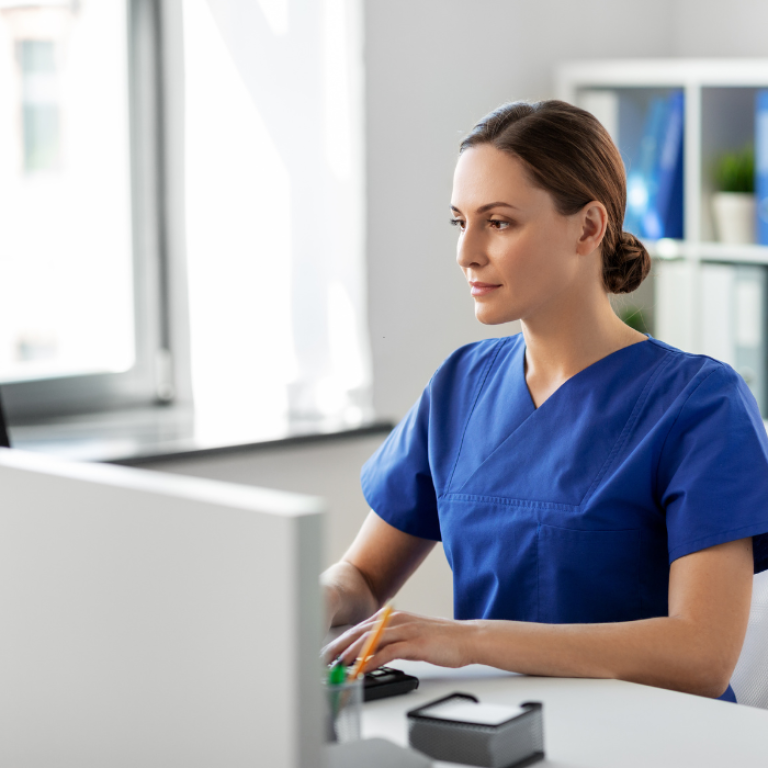 doctor documenting weight loss strategies in McLean
